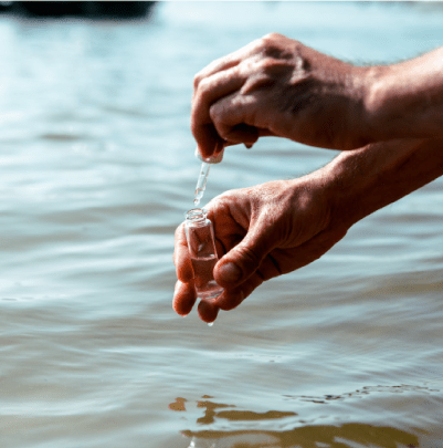 person collecting water sample