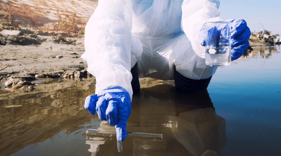 a lab person collecting water